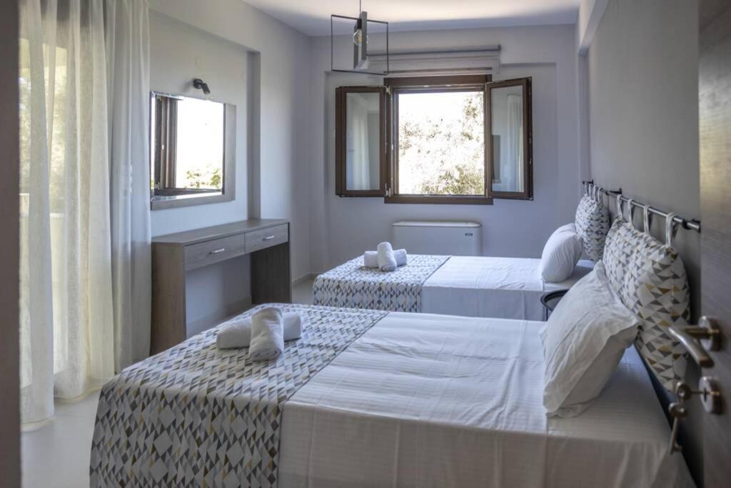 Mela Luxury Apartments Maroulas Luaran gambar