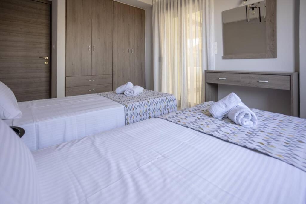 Mela Luxury Apartments Maroulas Luaran gambar
