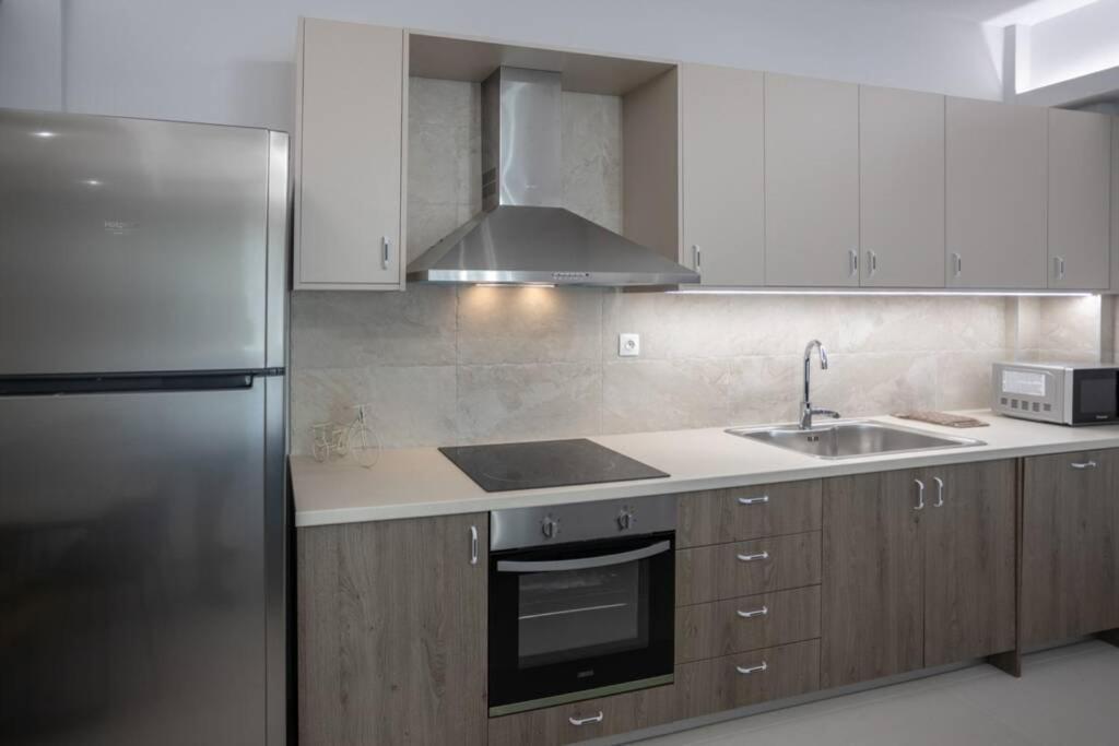 Mela Luxury Apartments Maroulas Luaran gambar